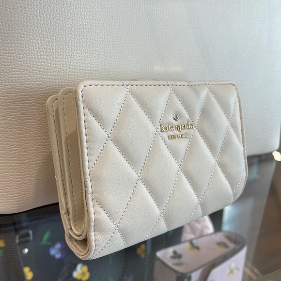 Kate Spade Carey Medium Compartment Bifold Wallet 
COLOR: Parchment - Picture 15 of 16